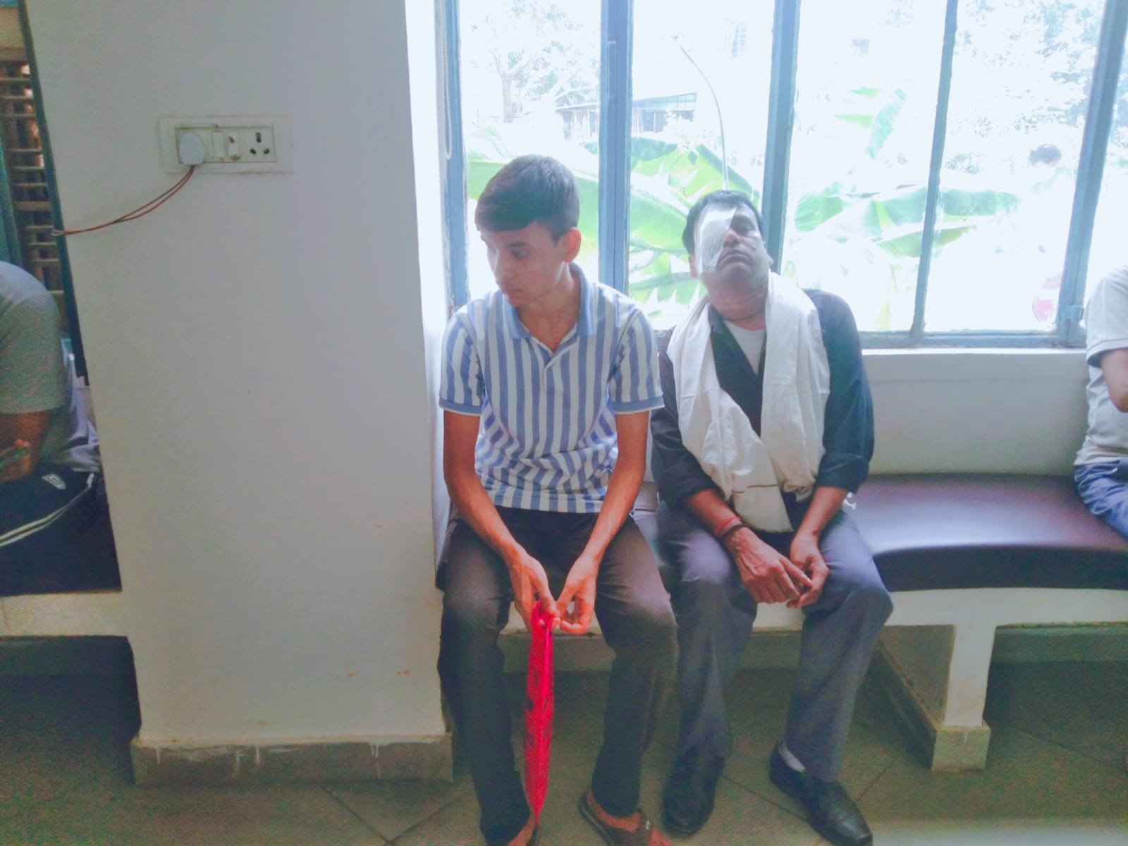 Ophthalmologist Performing Optical Screening Procedure
